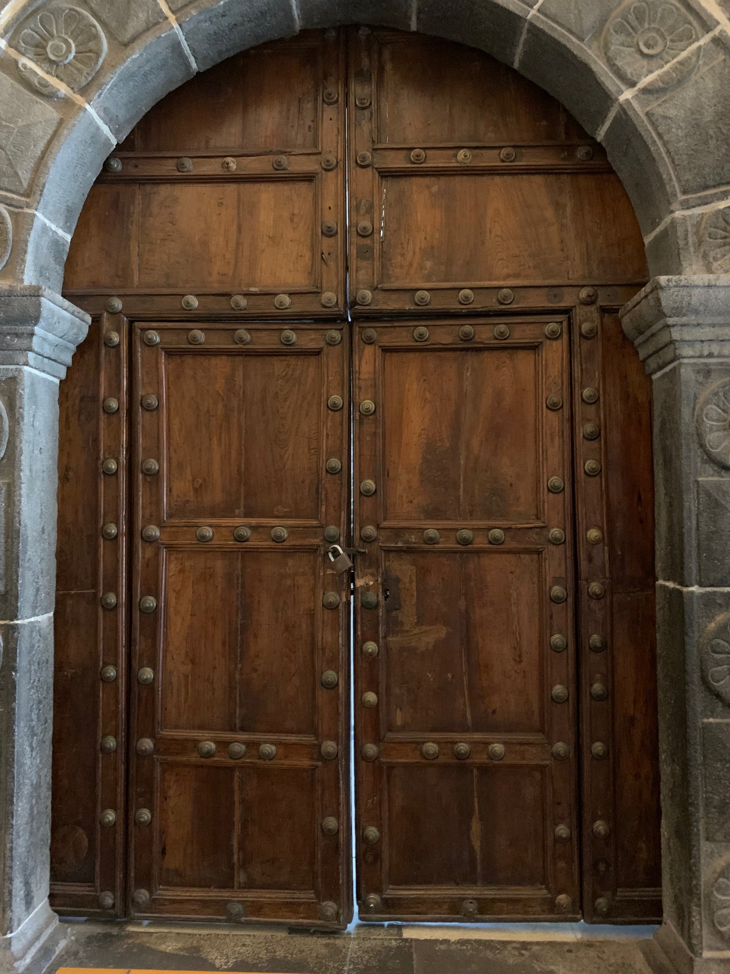 Arched wooden door