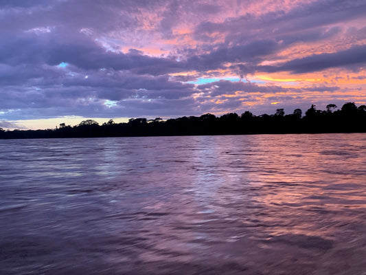 Purple skies over water